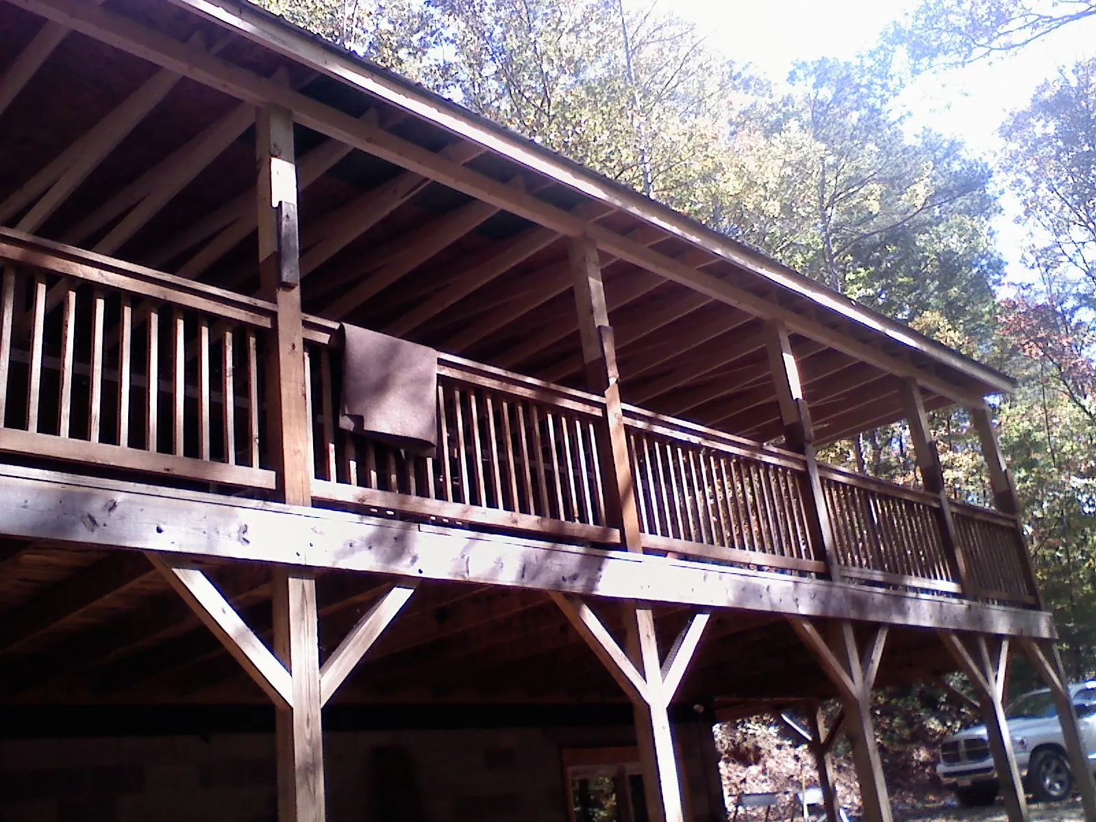 Timber framing under a new elevated porch and deck — Roof Leak Repair in Uniondale by Roofing Brothers
